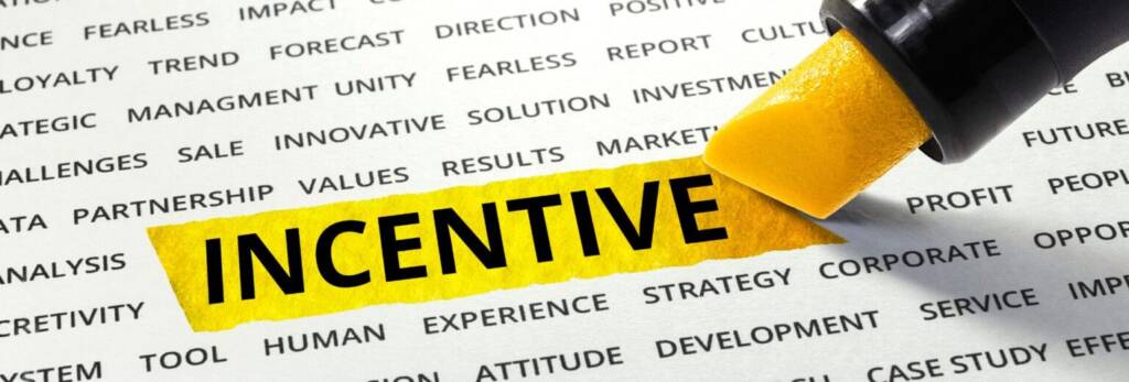 evidenziatore che evidenzia la frase "incentivo" su un documento riferito all'industria 4.0
